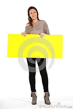 Beautiful woman holding a yellow, blank paper Stock Photo
