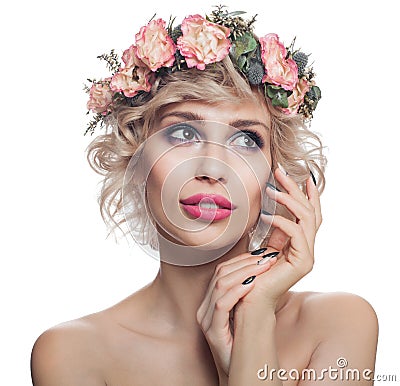 Beautiful woman isolated on white. Portrait of pretty model with makeup, blonde hair and flowers Stock Photo