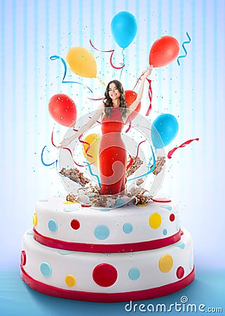 Beautiful woman jumping out of the cake Stock Photo