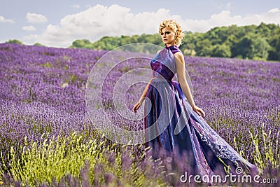 Beautiful woman in lavender fields Stock Photo