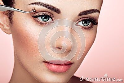 Beautiful woman with long false eyelashes Stock Photo