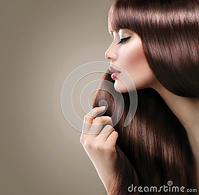 Beautiful woman with long smooth shiny straight hair Stock Photo