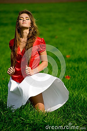 Beautiful woman in meadow Stock Photo