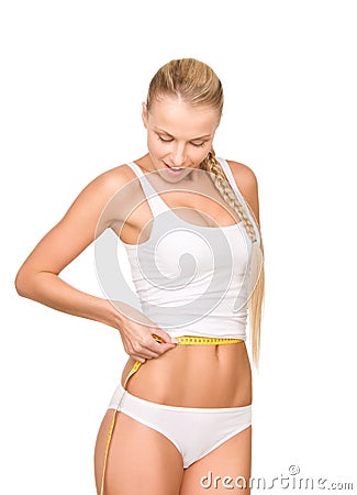 Beautiful woman with measure tape Stock Photo