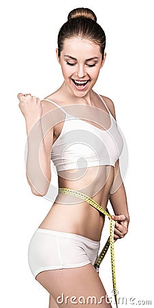 Beautiful woman with measure tape Stock Photo