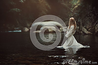 Beautiful woman in mystical stream Stock Photo