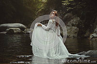 Beautiful woman in mystical waters Stock Photo