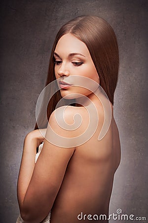 Beautiful woman with naked back portrait Stock Photo