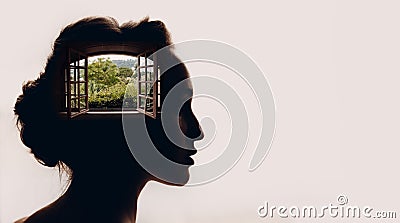 Beautiful woman with opened window with garden in her head. Stock Photo