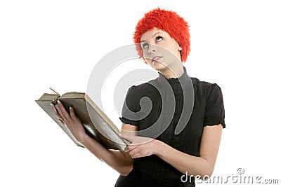 Beautiful woman, orange wig reading old book Stock Photo