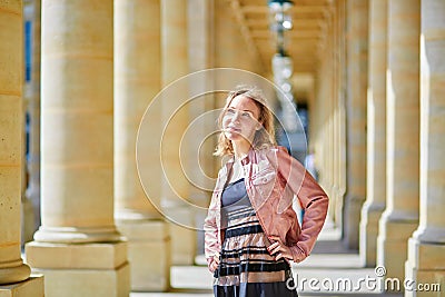 Beautiful woman in Palais Royale in Paris Stock Photo