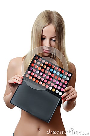 The beautiful woman with a palette eye shadow Stock Photo