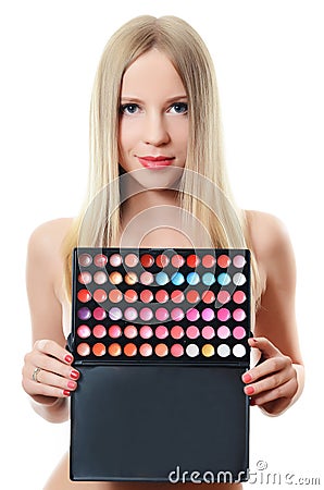 The beautiful woman with a palette eye shadow Stock Photo