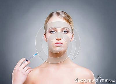Beautiful woman pampering herself in the beauty clinic Stock Photo