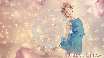 Beautiful woman in a pink peony flower fantasy Stock Photo