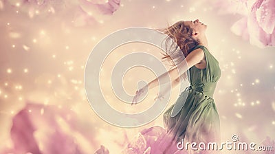 Beautiful woman in a pink peony flower fantasy Stock Photo