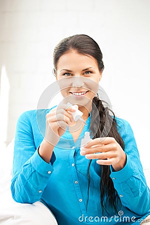 Beautiful woman polishing her nails Stock Photo