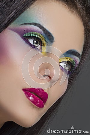 Beautiful woman portrait with bright colourful makeup Stock Photo