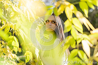 beautiful woman portrait outdoor with early autumn park background Stock Photo