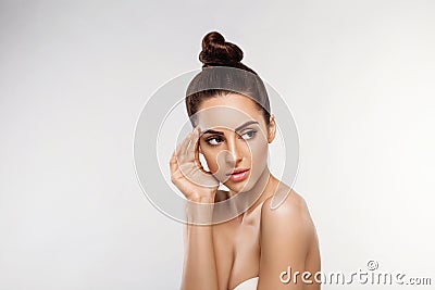 Beautiful woman portrait, skin care concept, Skin care. Dermatology. Portrait of female hands with manicure nails touching her fac Stock Photo