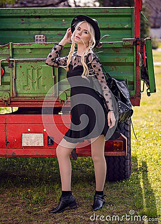 Beautiful woman in posing outdoors Stock Photo