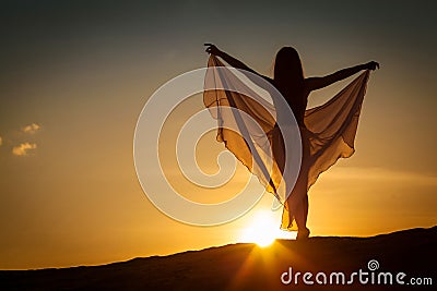 Beautiful woman posing at sunset Stock Photo