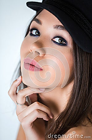Beautiful woman with professional make up and hairstyle. Close up. Girl with a smile Stock Photo