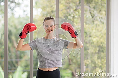 Beautiful woman with the red boxing gloves Stock Photo