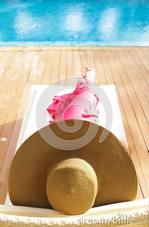 Beautiful woman relaxing near pool Stock Photo