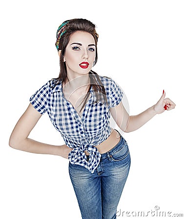 Beautiful woman in retro pin-up style showing thumbs up Stock Photo