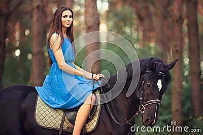 https://thumbs.dreamstime.com/x/beautiful-woman-riding-horse-forest-portriat-smiling-young-brunette-girl-blue-dress-ride-black-70419460.jpg