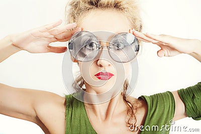 Beautiful woman in the round gray sunglasses Stock Photo