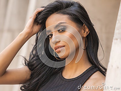 Beautiful woman`s face with gorgeous dark eyes. Stock Photo