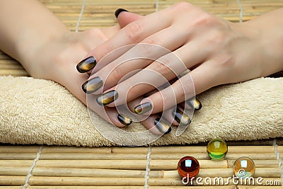 Beautiful woman's nails with nice stylish manicure Stock Photo