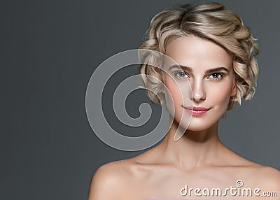 Beautiful woman short blonde hair and hands manicure nails elegant beauty portrait. Stock Photo