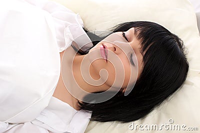 Beautiful woman sleeping in the bed Stock Photo
