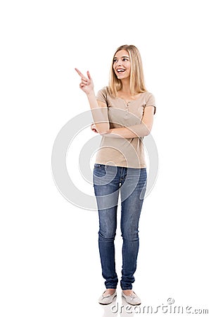 Beautiful woman smiling and pointing Stock Photo