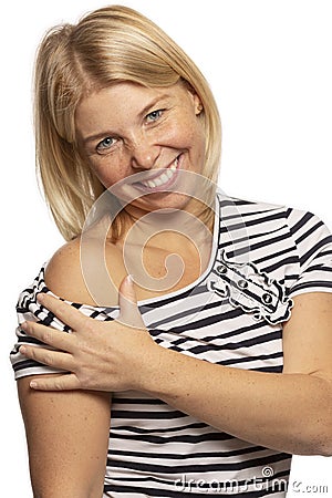 Beautiful woman smiling sexually bare shoulder Stock Photo