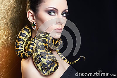 Beautiful woman with Snake Stock Photo