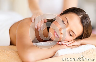 Beautiful woman in spa salon getting massage Stock Photo