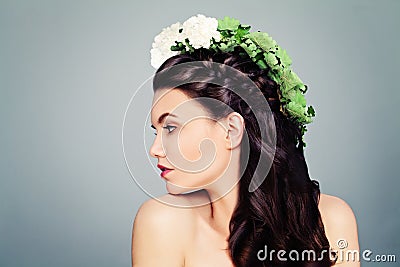 Beautiful Woman in a Summer Wreath Stock Photo