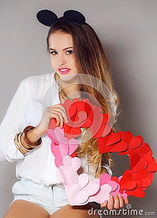 Beautiful woman with a symbol of Valentine's day. Stock Photo