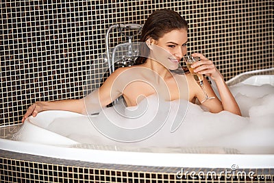 Beautiful Woman Takes Bubble Bath. Stock Photo