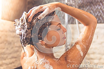 Beautiful woman taking shower Stock Photo