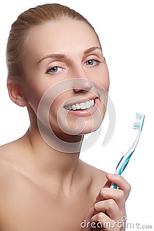 Beautiful woman with toothbrush. Dental care background. Closeup on young woman showing toothbrush. Beautiful young woman Stock Photo