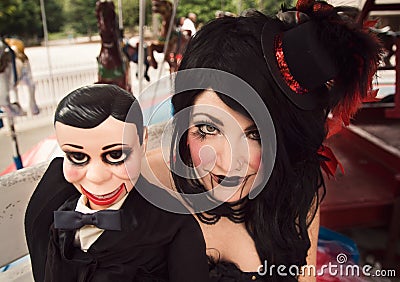 Beautiful Woman With Ventriloquist Dummy Stock Photo