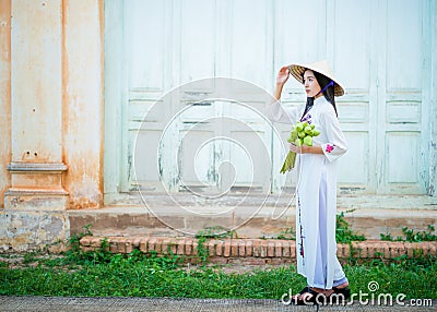 Beautiful woman with Vietnam culture tranditional dress Stock Photo