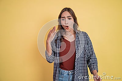 a beautiful woman with waving hand gesture when spiciness with copyspace Stock Photo
