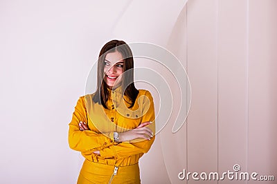 Beautiful woman in yellow shirt and skirt Stock Photo