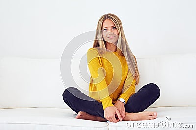 Beautiful woman in yellow sweater Stock Photo